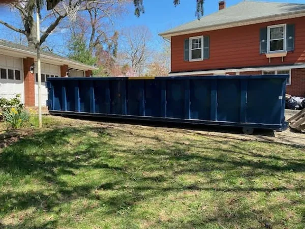 A 20 yard roll-off dumpster at a home in Bergen County NJ