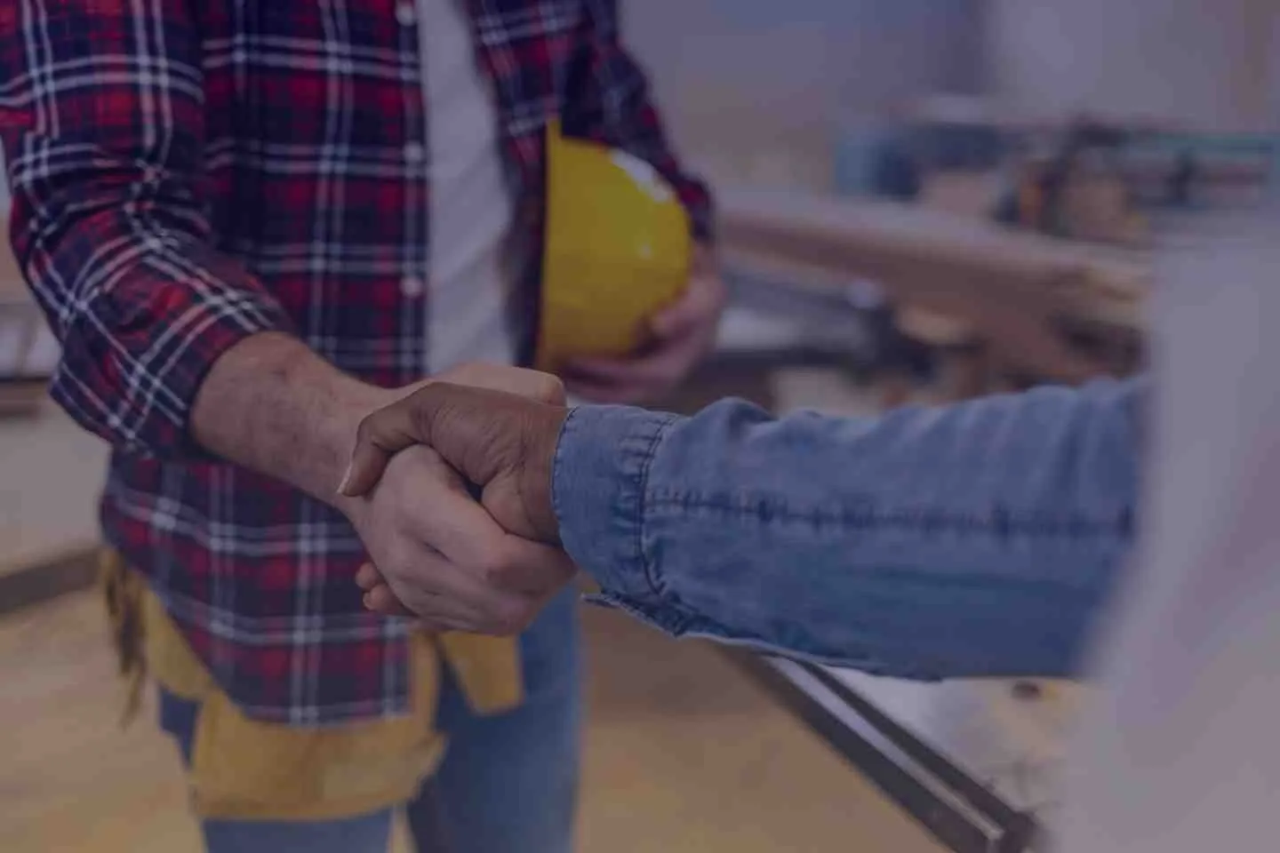Man and contractor shaking hand